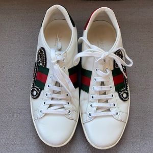 Gucci Ace Safety Pin Lace Up Low Top Sneakers.